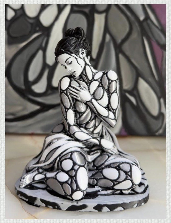 Sculpture of a seated figure covered in organic forms